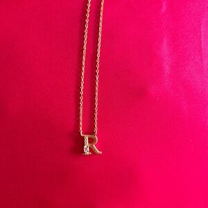 Gold “R” necklace